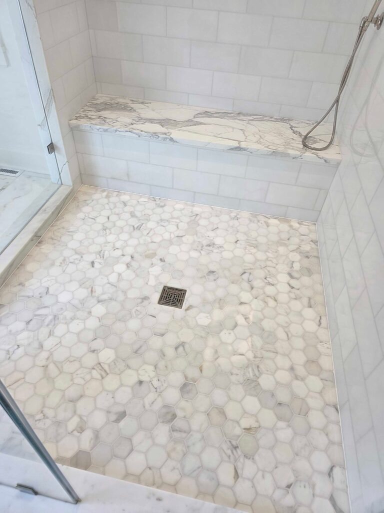 Hexagonal marble shower floor, Rose Restoration project