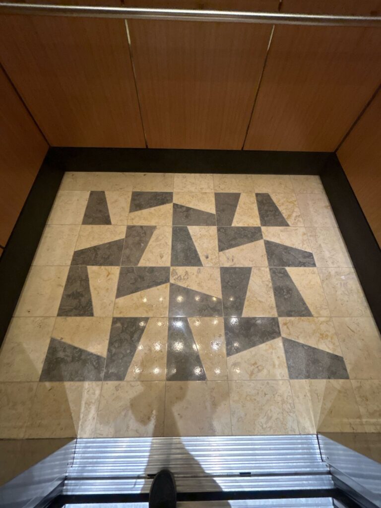 After: the same inlaid stone floor in Washington, DC after Rose Restoration's work