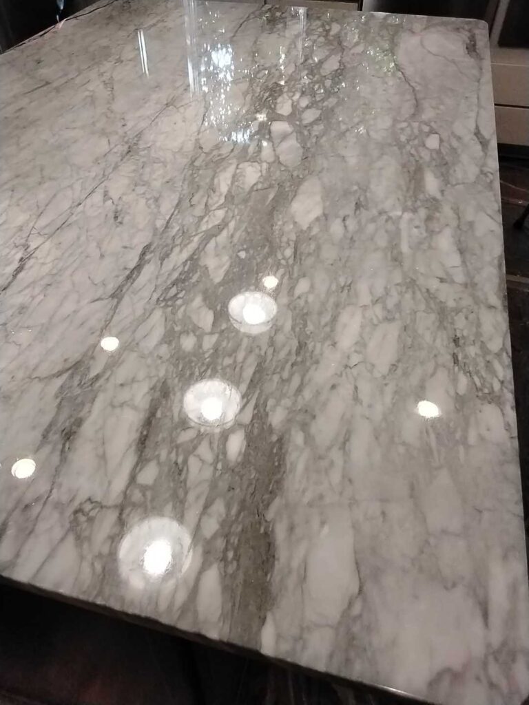 After: the same kitchen island countertop with a crack in Arlington, VA after Rose Restoration's work