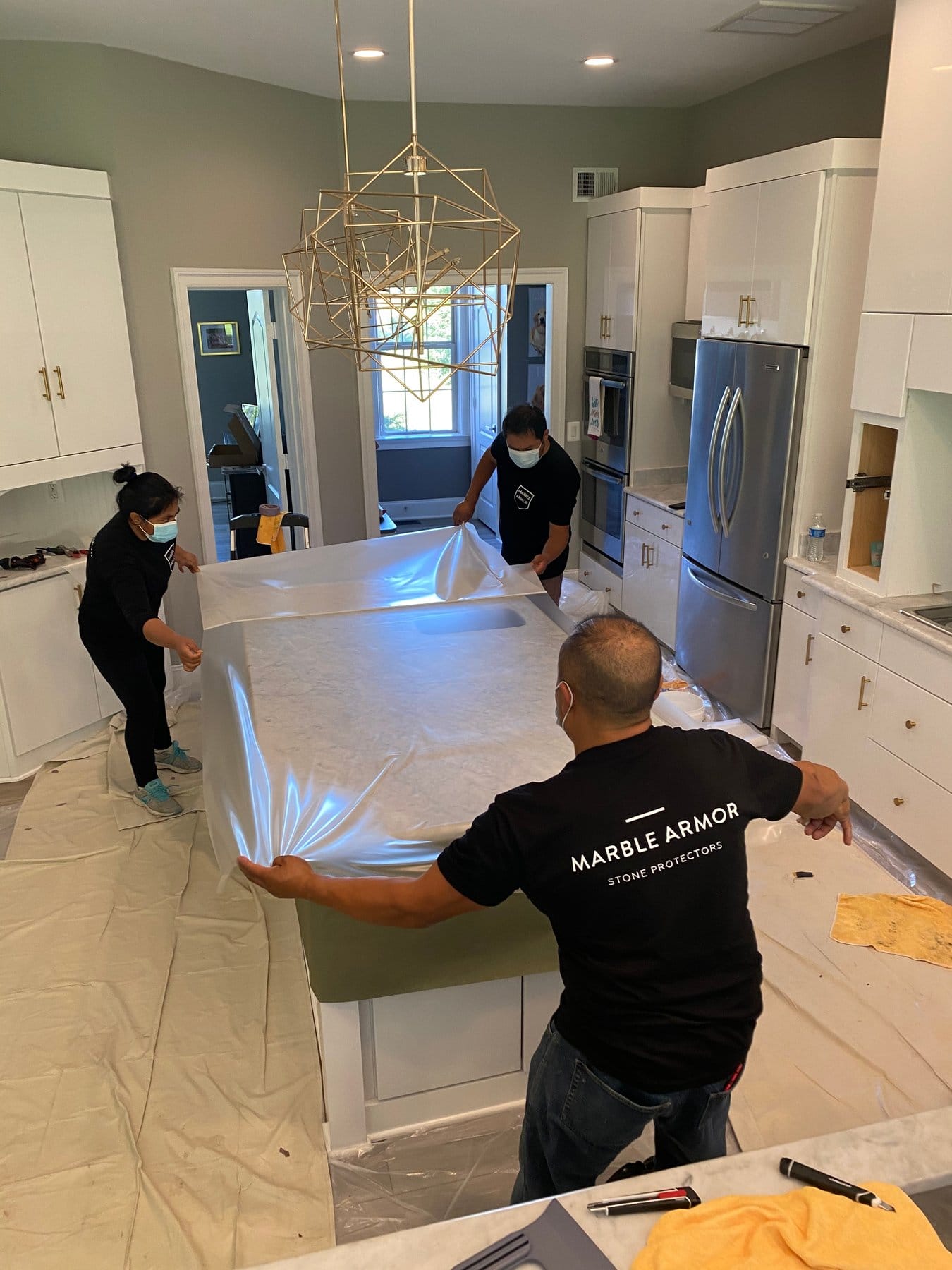 Marble Armor film laid out across a kitchen island
