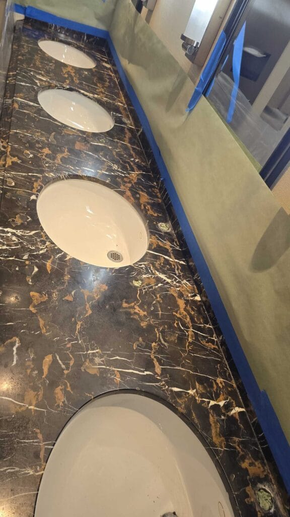 Marble countertop with undermount sinks from a Rose hotel job in Oxon Hill, MD
