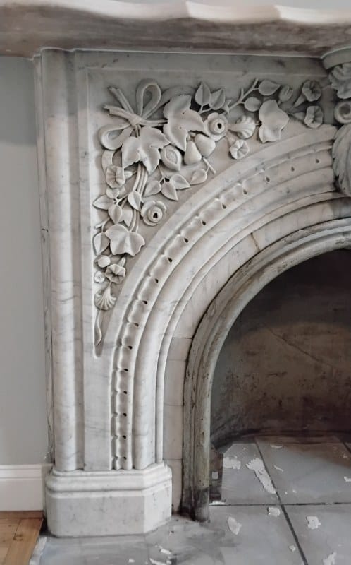 Marble fireplace with floral carving from a Rose job in Washington, DC
