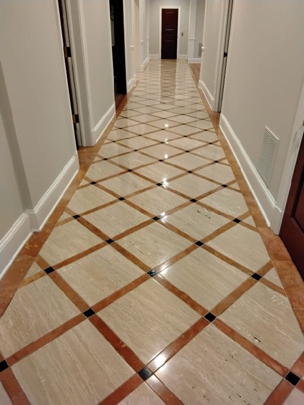 Polished marble hallway floor with a diagonal pattern in a Great Falls, VA home