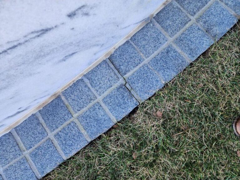 Marble mausoleum wall at the paver edge, Rose Restoration project