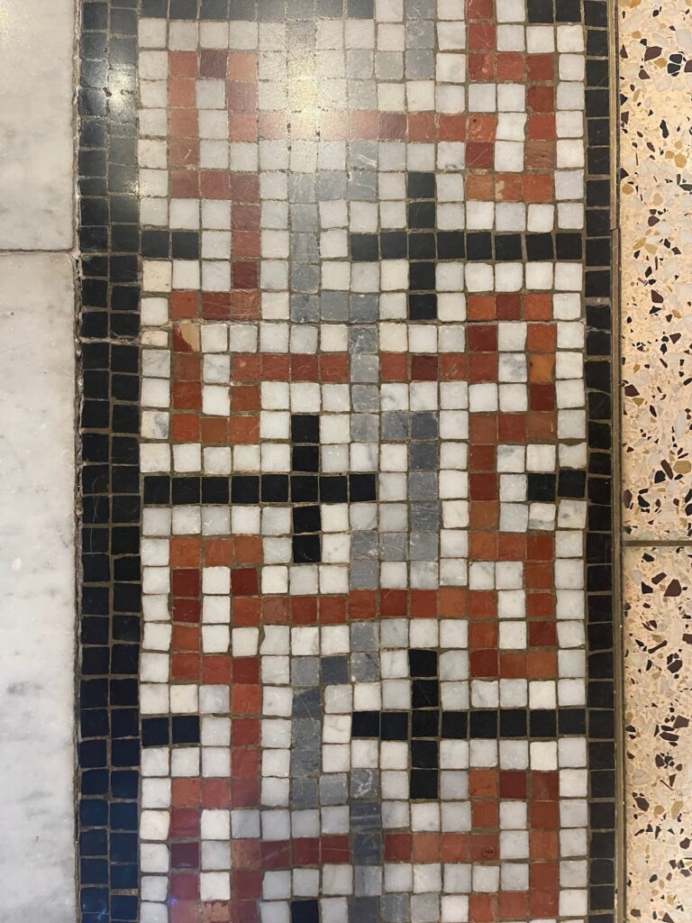 Mosaic tile floor with black border in a church, Rose Restoration project