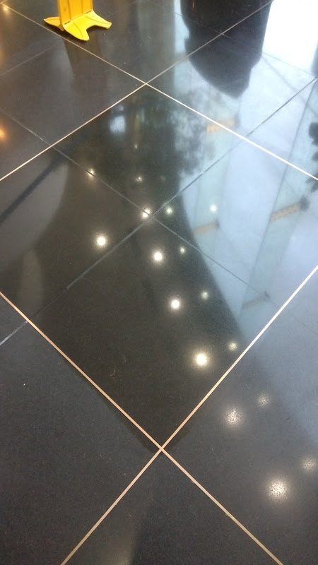 Polished black stone floor, Rose Restoration project