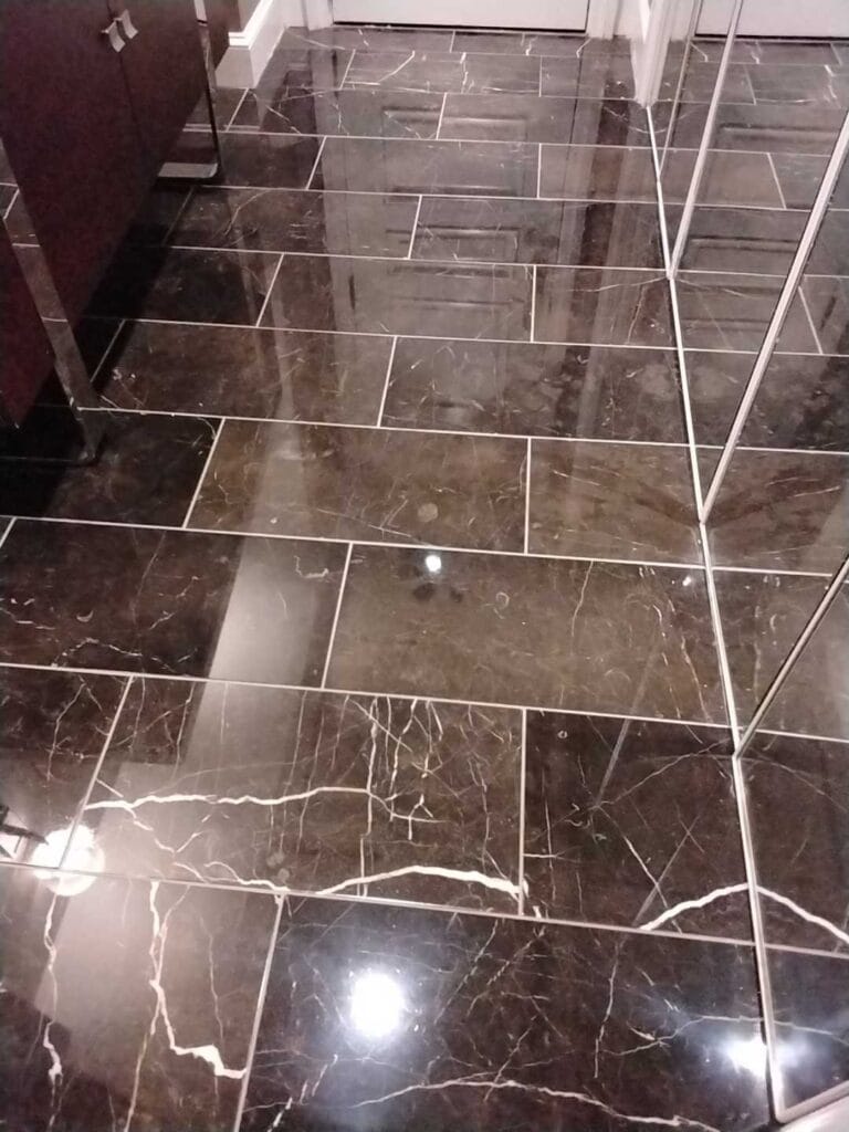 Polished dark marble floor from a Rose hotel job in Washington, DC