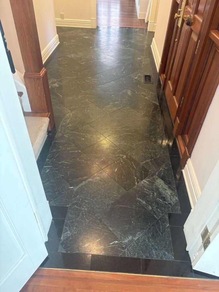 Polished dark stone floor, Rose Restoration project