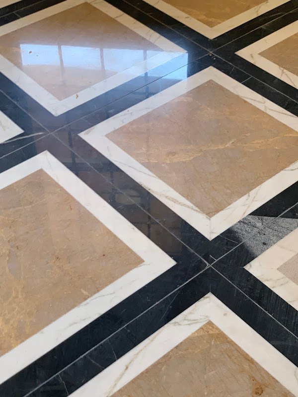Polished marble floor with geometric pattern, Rose Restoration project