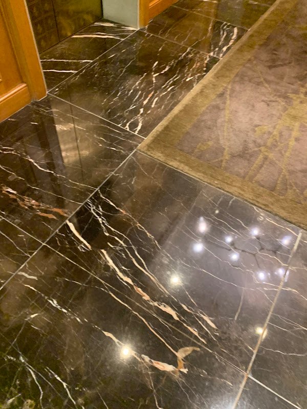 Polished marble floor with veining, Rose Restoration project