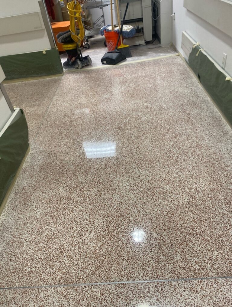 Polished speckled stone floor in an embassy, Rose Restoration project