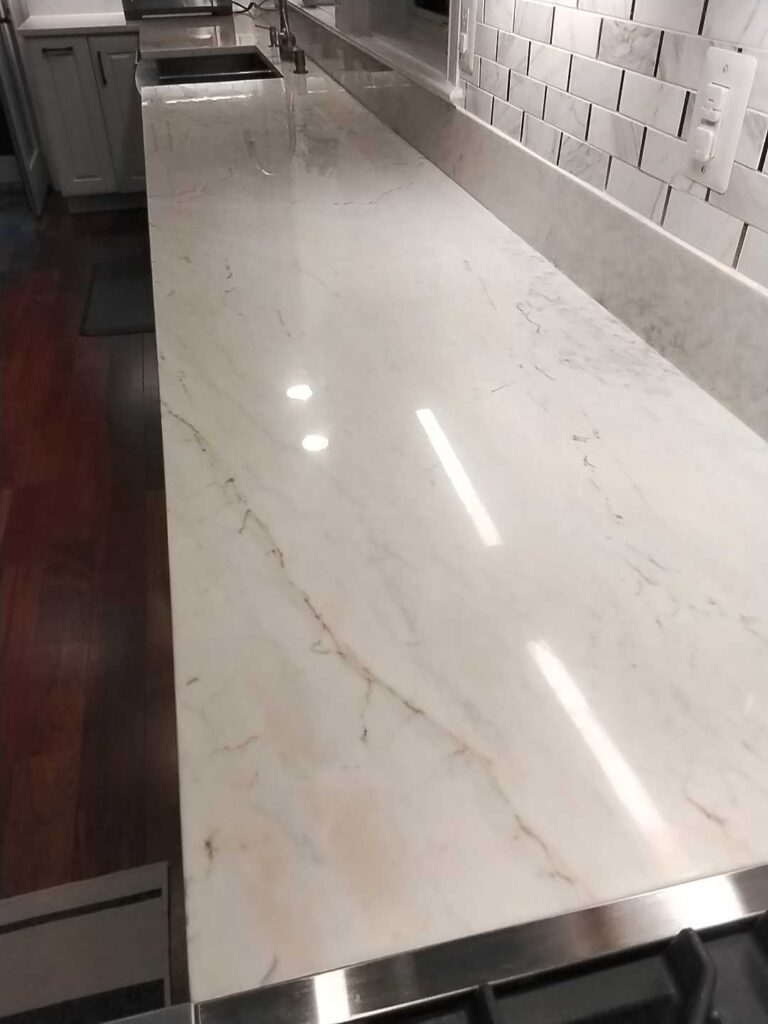 Polished stone countertop with sink, Rose Restoration project