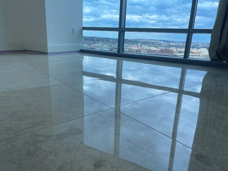 Polished stone floor reflecting sky, Rose Restoration project