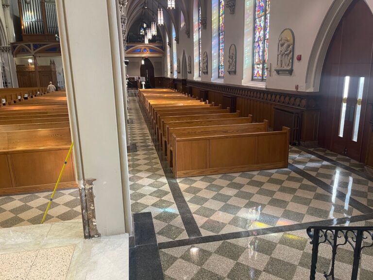 Polished stone floor with checkered pattern in a church, Rose Restoration project