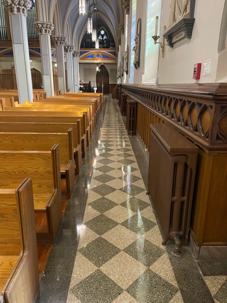 Polished stone floor with diamond pattern in a church, Rose Restoration project