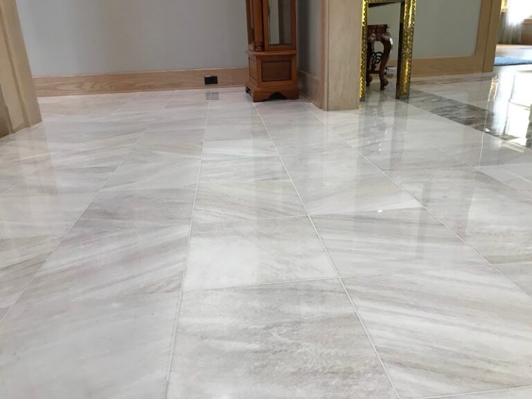 Polished stone floor with marble veins, Rose Restoration project