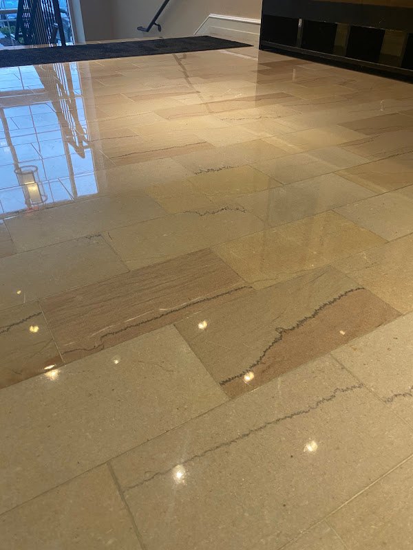 Polished stone floor with natural veins, Rose Restoration project