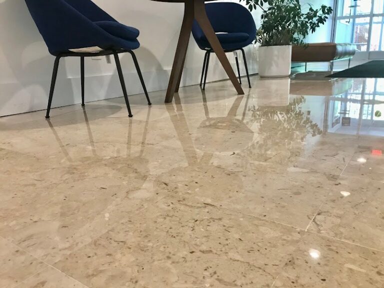 Polished stone floor with reflective surface, Rose Restoration project