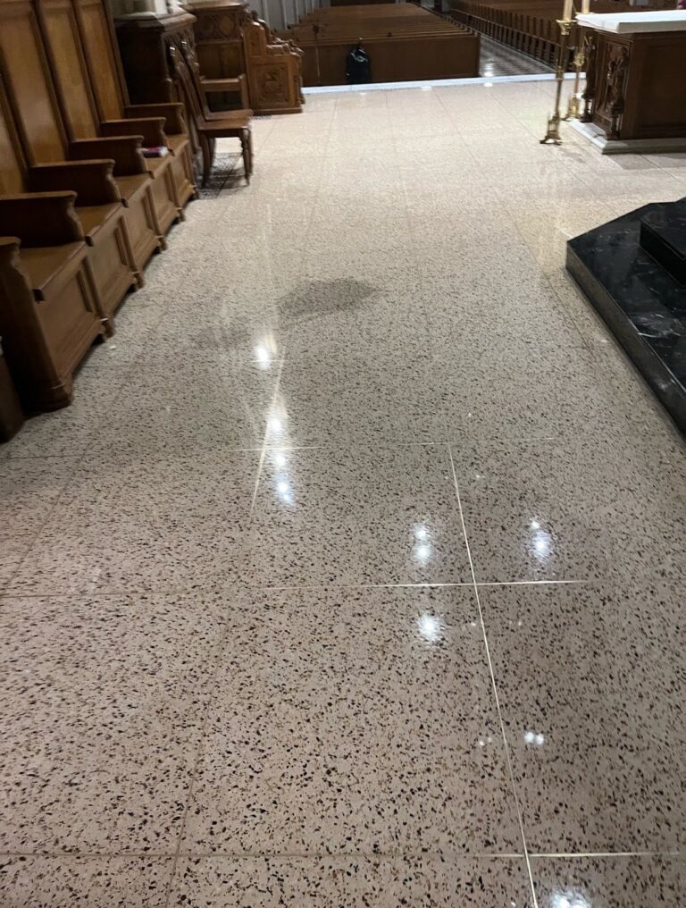 Polished stone floor with speckles in a church, Rose Restoration project