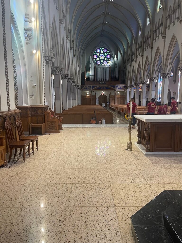 Polished stone floor with speckles in a church, Rose Restoration project