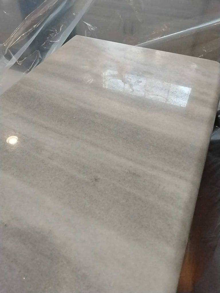 Quartzite countertop under plastic protection during restoration in Vienna, VA