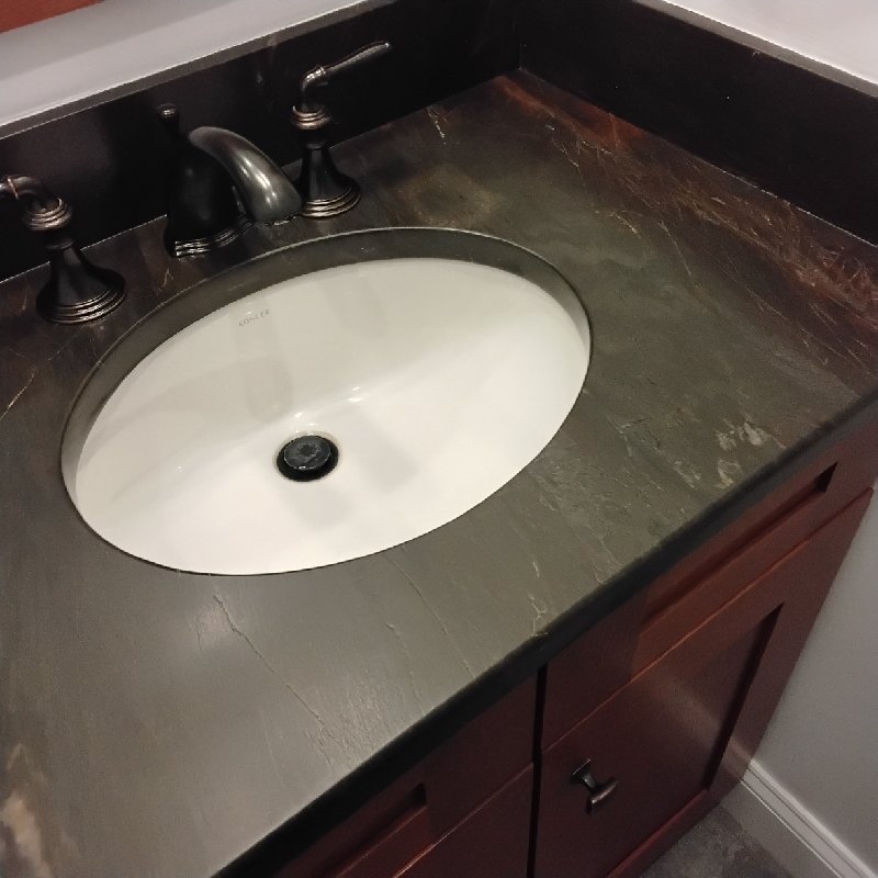 After: the same quartzite vanity top in Gaithersburg, MD after Rose Restoration's work