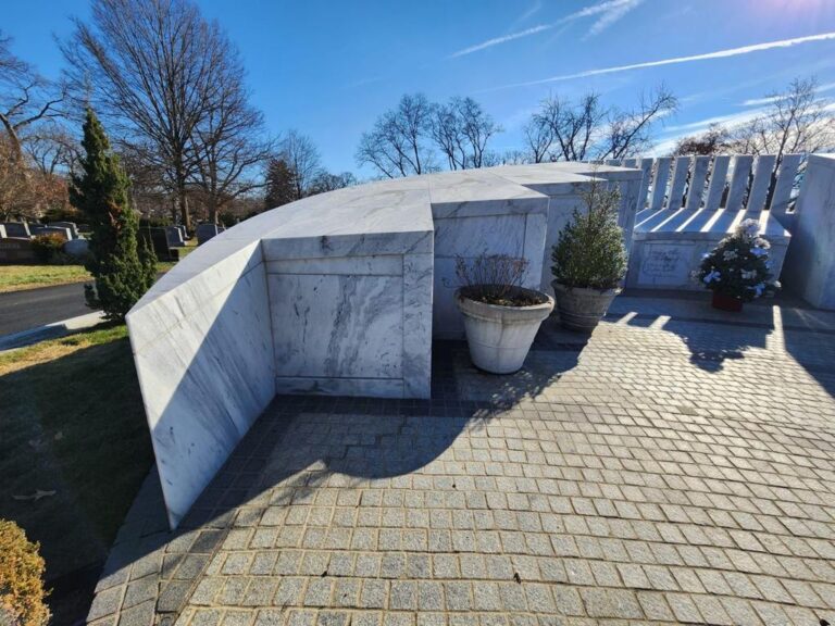 Stone mausoleum and paver court in a cemetery, Rose Restoration project