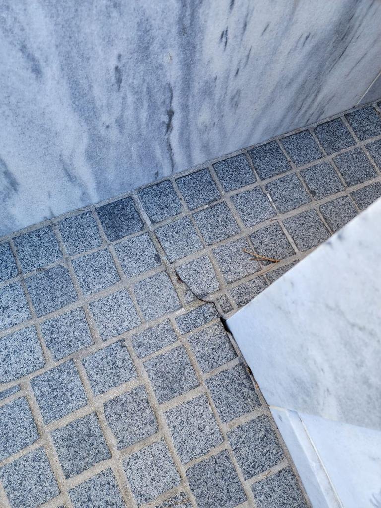 Stone pavers at a marble mausoleum wall, Rose Restoration project
