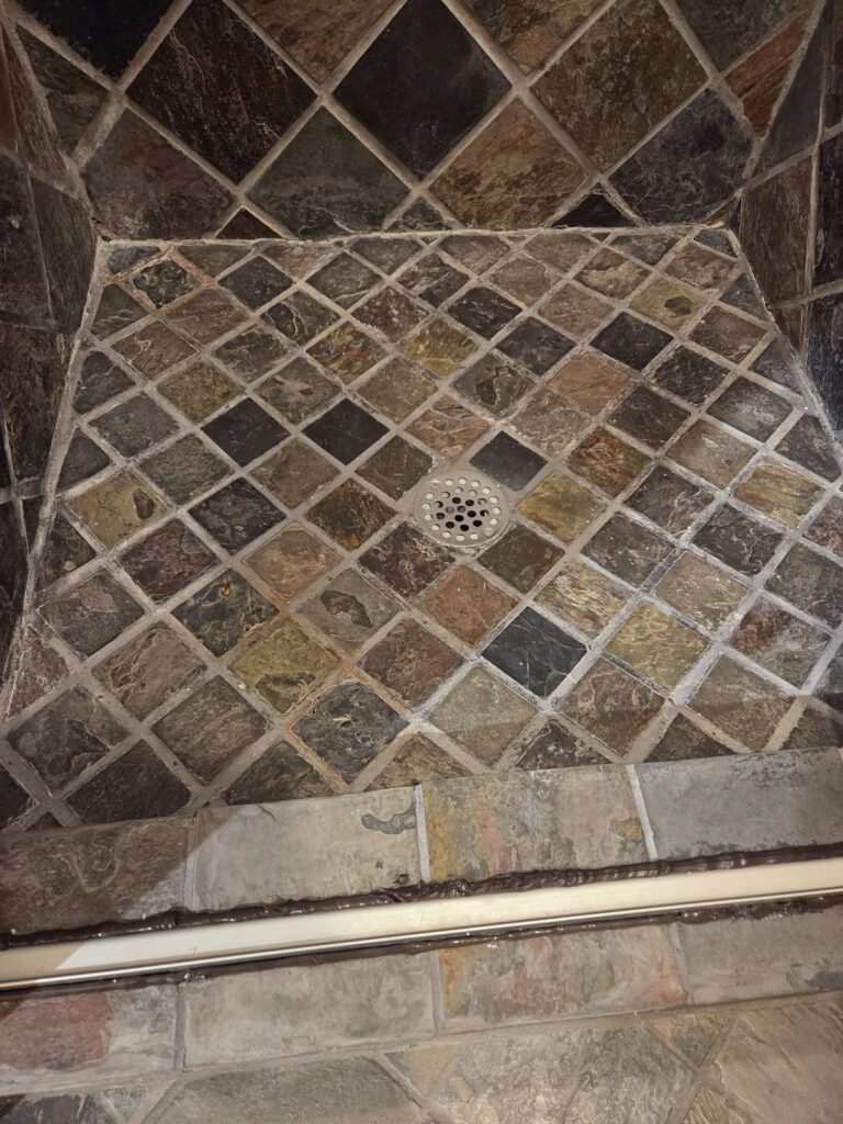 Stone shower floor with drain, Rose Restoration project