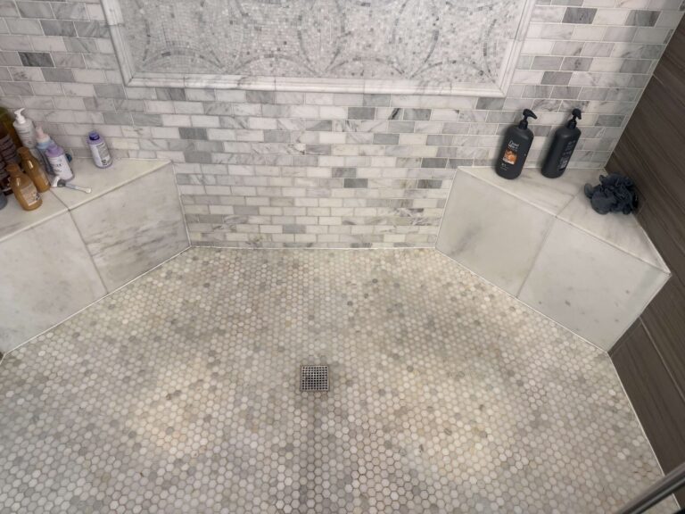 Stone shower floor with mosaic tiles, Rose Restoration project