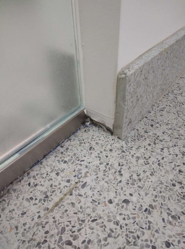 After: the same terrazzo base at a shower in Silver Hill, MD after Rose Restoration's work
