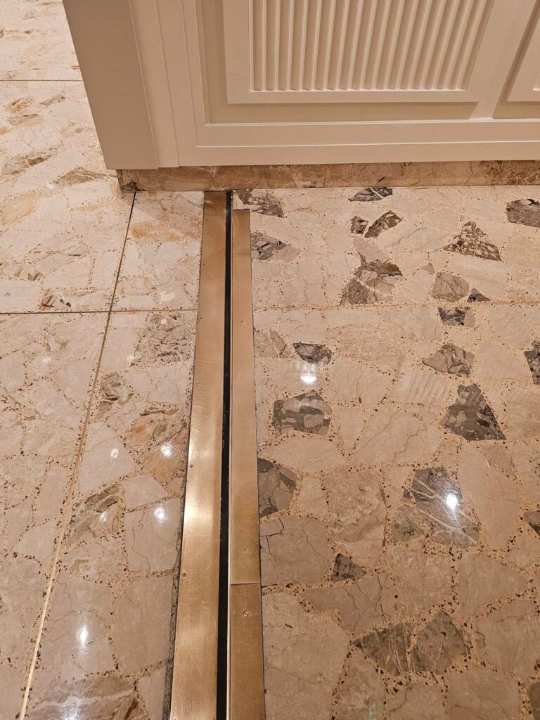 After: the same condominium lobby terrazzo in Washington, DC after Rose Restoration's work