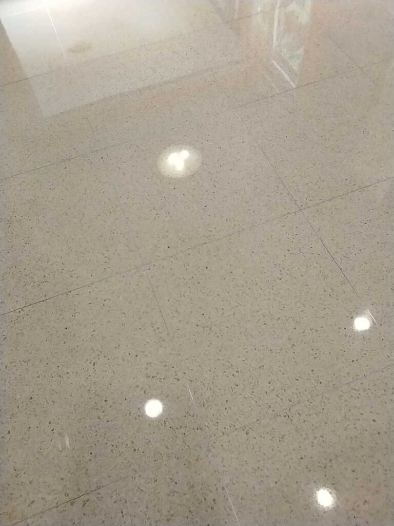 After: the same terrazzo kitchen floor in Bethesda, MD after Rose Restoration's work