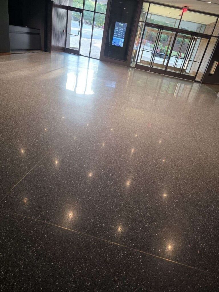 Before: terrazzo lobby floor in Charlottesville, VA, photographed by Rose Restoration before the work