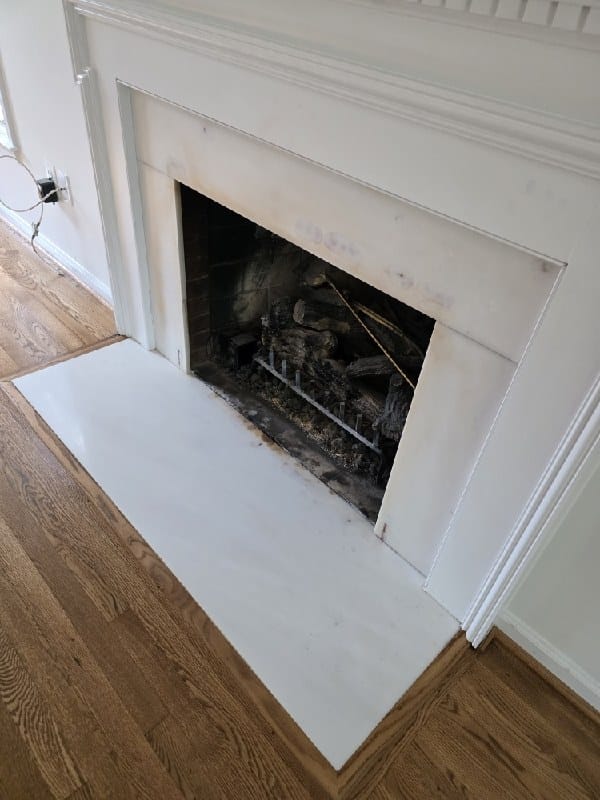 White marble fireplace surround from a Rose job in Alexandria, VA