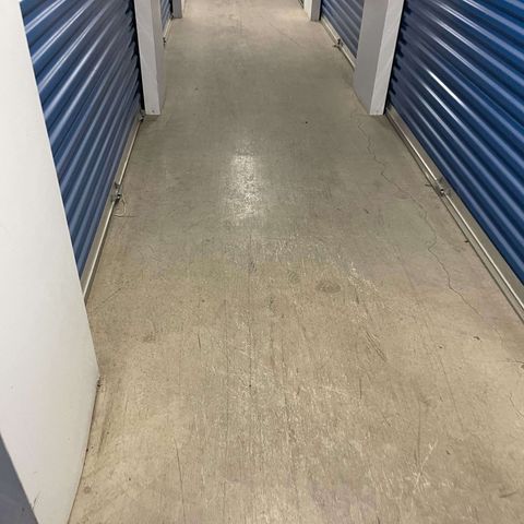 Storage facility corridor before restoration