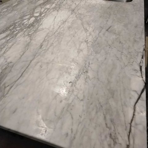 White stone kitchen island before restoration