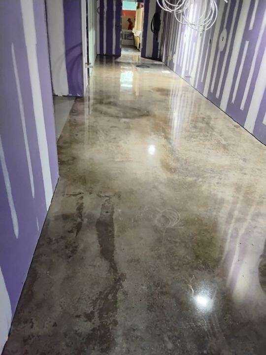 Concrete work at a retail space in Arlington, VA, work by Rose Restoration